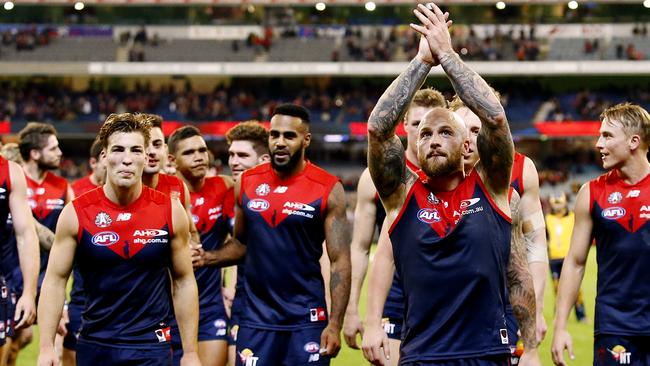 AFL: Round 5 Melbourne v Richmond Nathan Jones leads the Demons off the mcg Picture:Wayne Ludbey