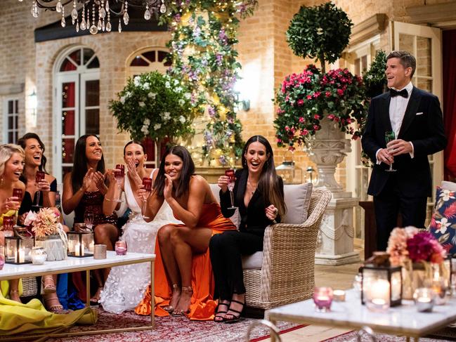 Osher Günsberg chats with some of the women trying to win Jimmy Nicholson's heart in The Bachelor 2021. Picture: Ten