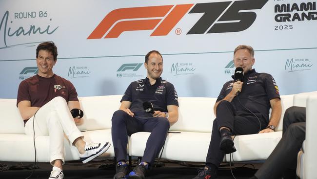Team bosses Toto Wolff, Oliver Oakes (centre) and Christian Horner. AP Photo/Rebecca Blackwell.