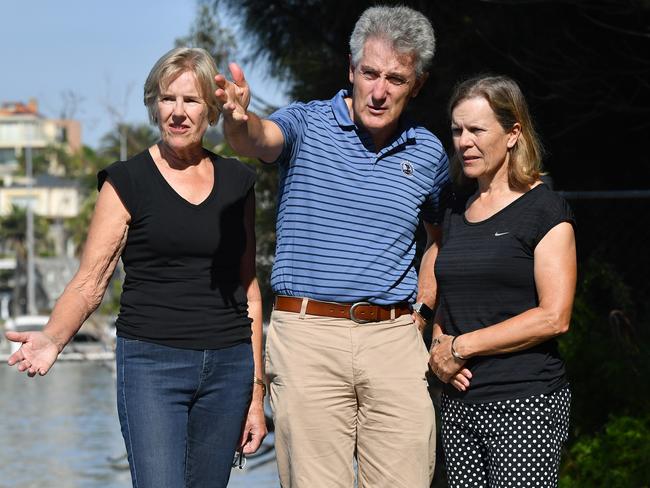 Philippa Clarke, John Atkin and Judy Haddrick at the foreshore of the contaminated site. Picture: Joel Carrett