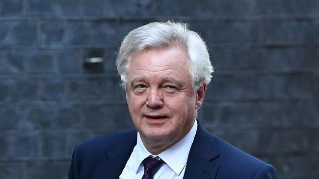 British Secretary of State for Exiting the European Union (Brexit Minister) David Davis arrives in Downing Street in London on March 15, 2017. Britain's Prime Minister Theresa May said Tuesday she would be given the power to start Brexit talks within days but declined to name a date for a process already disrupted by Scotland's independence bid. / AFP PHOTO / Ben STANSALL