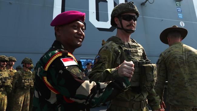 Indonesian National Armed Forces Head of Delegation Lieutenant Colonel Empri Airudin during a ceremonial patch sharing ceremony aboard the HMAS Adelaide in Darwin ahead of Exercise Keris Woomera on November 3. Picture: Zizi Averill