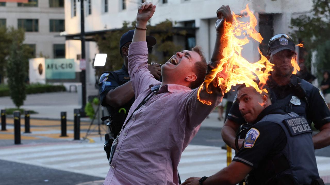 Horror as protester sets himself on fire