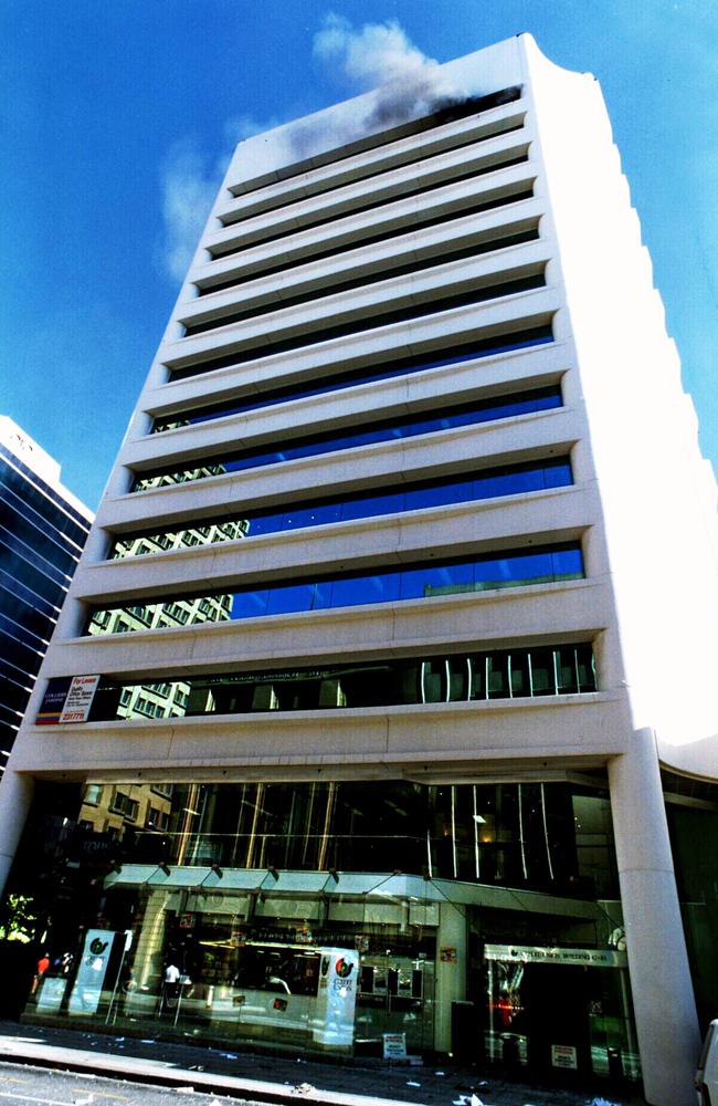 Smoke billows from 12th floor of the National Crime Authority building after the attack in 1994.