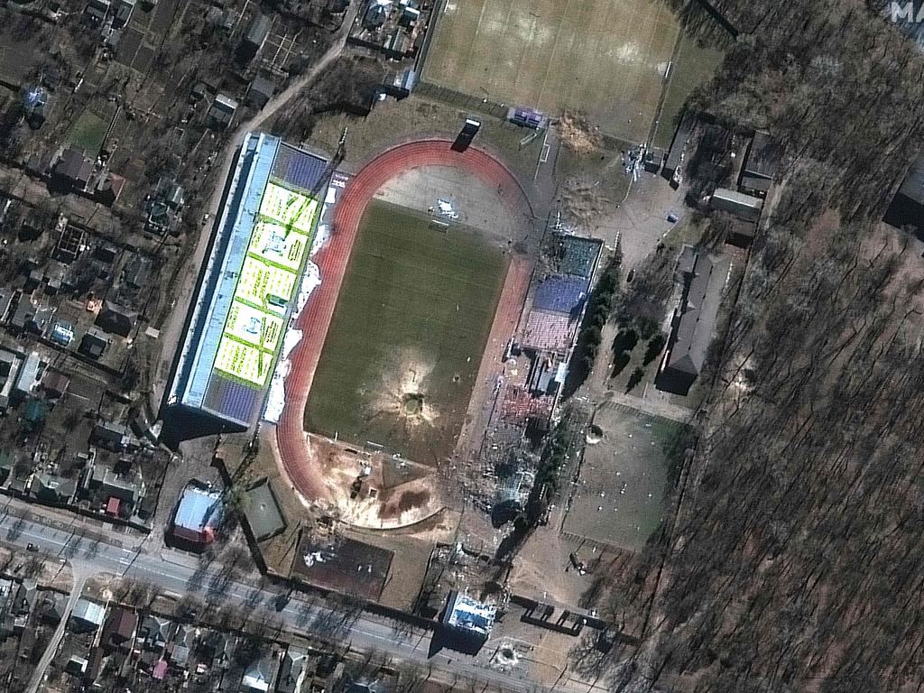 Large craters and a damaged Olympic sports training centre in Chernihiv, Ukraine. Picture: Satellite image Â©2022 Maxar Technologies / AFP