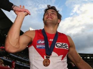 2012 Grand Final. Hawthorn v Sydney Swans. MCG. Swans player Josh Kennedy celebrates with fans