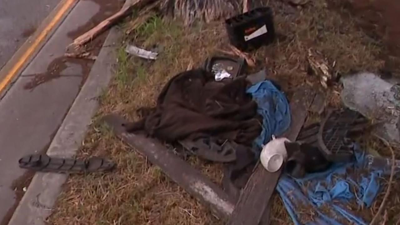 Three teenagers have been badly injured after a horror crash, with one fighting for life. Pictured is debris at the scene. Picture: 9News