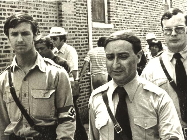 Frank Collin (centre) leaves his Nazi headquarters heading to a rally in a park in Chicago September 1978. Picture: UPI