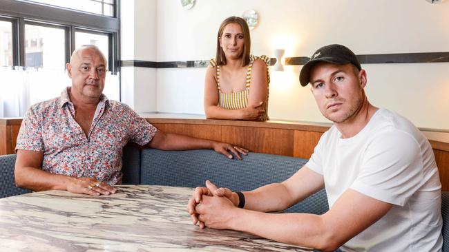 Restaurateur Simon Kardachi, left, with Laura and Max Sharrad at Fugazzi restaurant in Leigh Street, which has closed due to crippling Covid regulations. Picture: Brenton Edwards