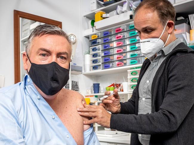 Eddie Mcguire receives a Covid vaccination from Dr. Sam Zagarella at Niddrie Medical. Picture: Jake Nowakowski