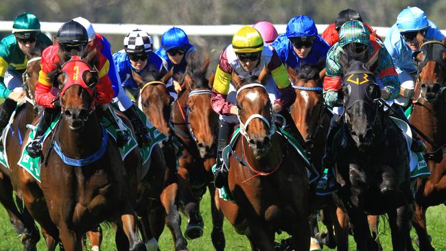 Loving home ridden by Tye Angland  (yellow cap, maroon with yellow armbands) wins race 1 during Scone  Races located in the Upper Hunter Region of NSW. The Bend . Pic Jenny Evans