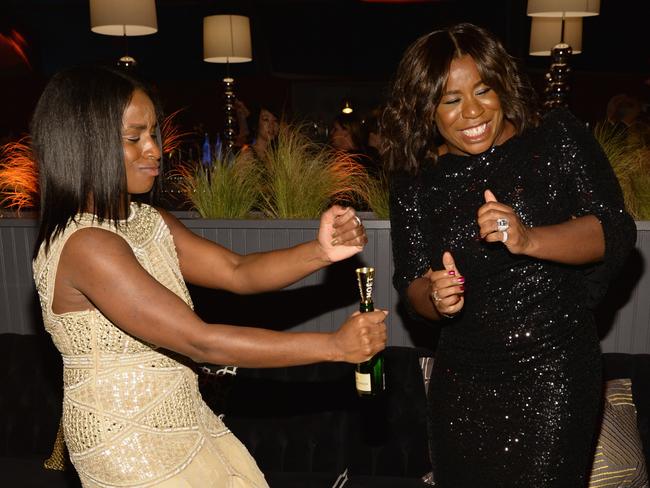 Uzo Aduba (right) attends The Weinstein Company and Netflix Golden Globe Party. Picture: Kevin Mazur/Getty Images for The Weinstein Company