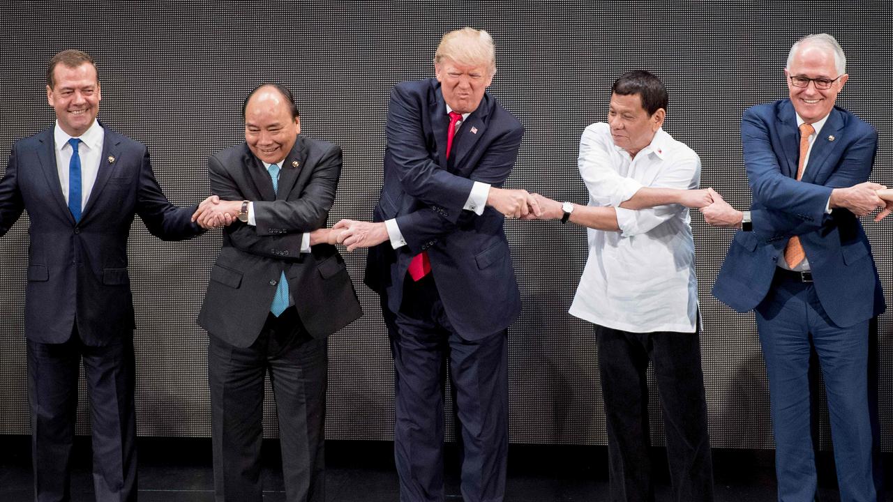 Rodrigo Duterte with leaders including Donald Trump and former Australia Prime Minister Malcolm Turnbull. Picture: Jim Watson/AFP