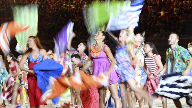 Performers dressed in beach attire during the ceremony. Picture: AAP/Dean Lewins