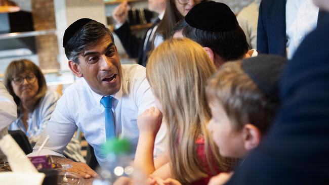 British Prime Minister Rishi Sunak during a visit to a bakery during a campaign event in Golders Green, north London, on Sunday. Picture: AFP