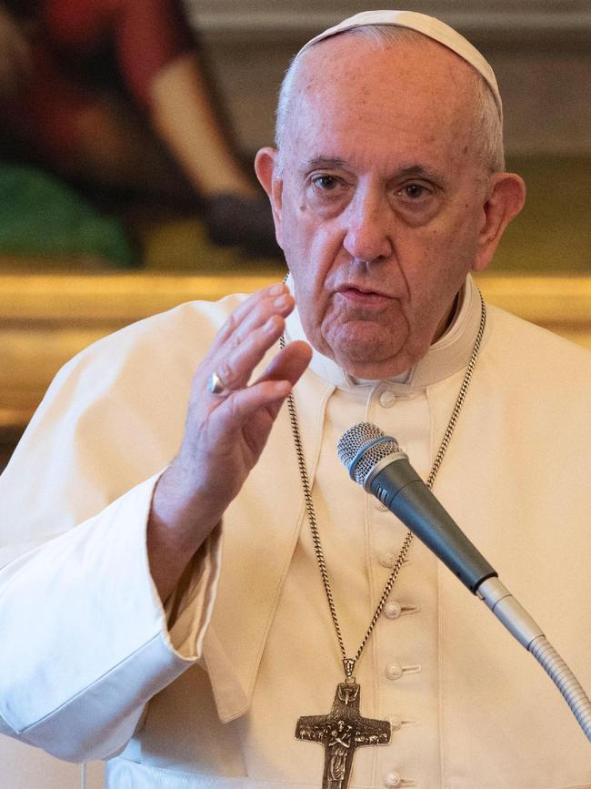 Pope Francis addresses sacked Cardinal Angelo Becciu. Picture: AFP/Vatican Media