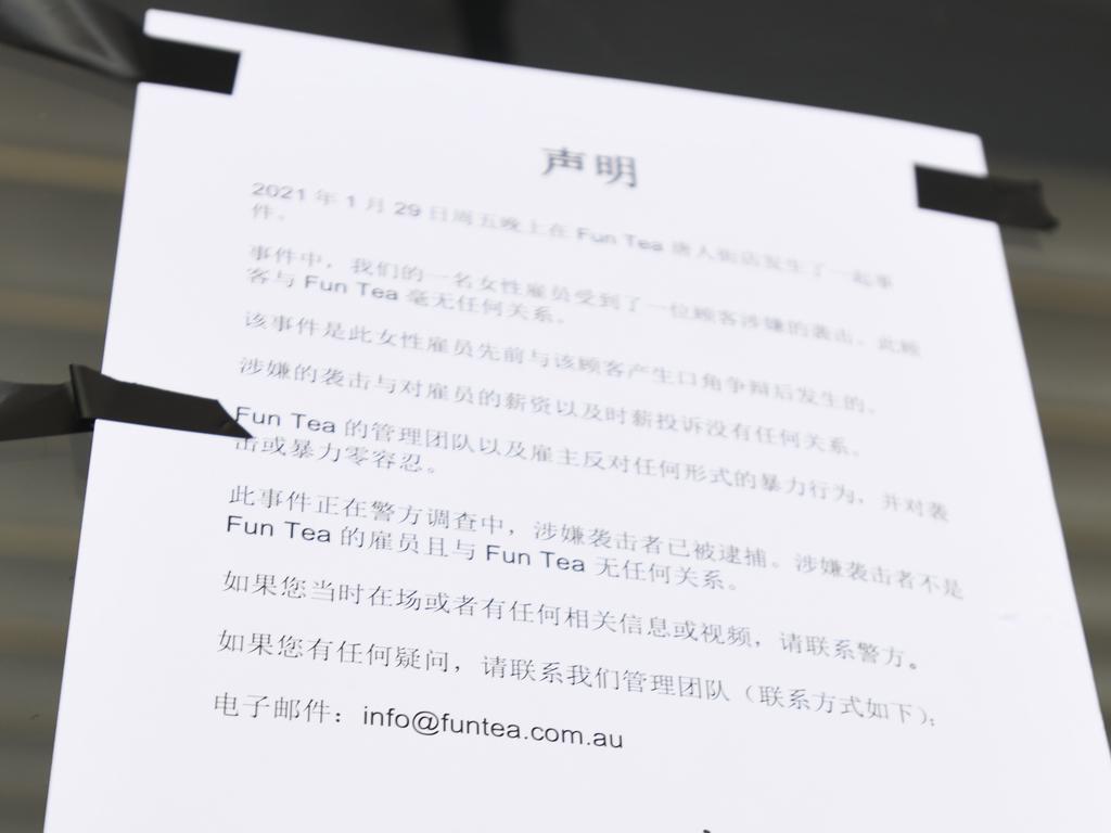 The business taped its statement, written in both in Mandarin and English, to the shop window. Picture: Naomi Jellicoe