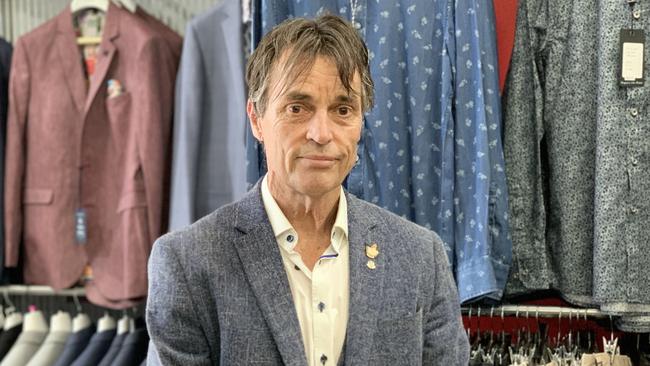 Harry Hutchinson, owner of Harry's Clothing in Berwick, has reopened his shop despite being threatened with fines. Picture: Suzan Delibasic