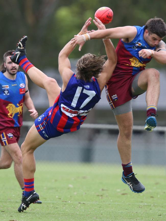 Football GDFL: Belmont Lions v Bell Post Hill Bell Post Hill 17 Will Ford takes a belter over Belmont Lions 42 Brad Storm ( right) Picture: Mark Wilson