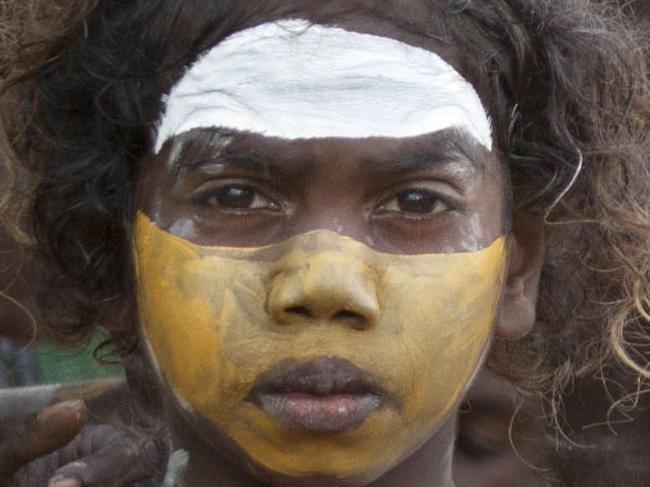 Members of the Gumatj (Gumatj) clan added a red V and the no.37 to their traditional paint in support of Adam Goodes.