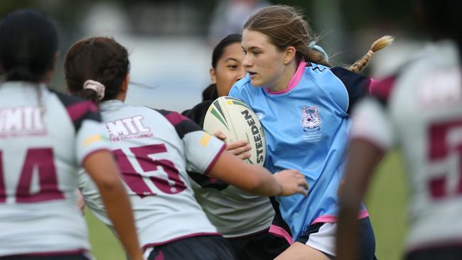 Titans Schools League at Burleigh Bears Junior Rugby League. .Year 9/10 Division 1 girls: - Marymount v Marsden. Marymounts Lily Ryder in heavy traffic. Picture Glenn Hampson