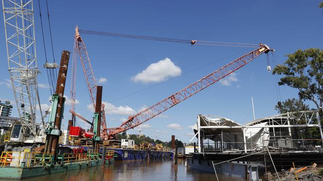 Cranes at work on the site of Drift Restaurant on the Brisbane River at Milton. Picture: Lachie Millard