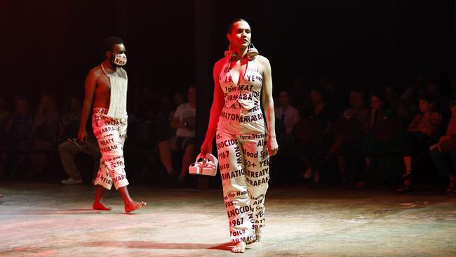Sarah Eggmolesse models the Yarrabah Affirmations collection by the Yarrabah Arts & Culture Precinct at the Cairns Indigenous Art Fair fashion performance, Woven, held at the Tanks Arts Centre, Edge Hill. Picture: Brendan Radke