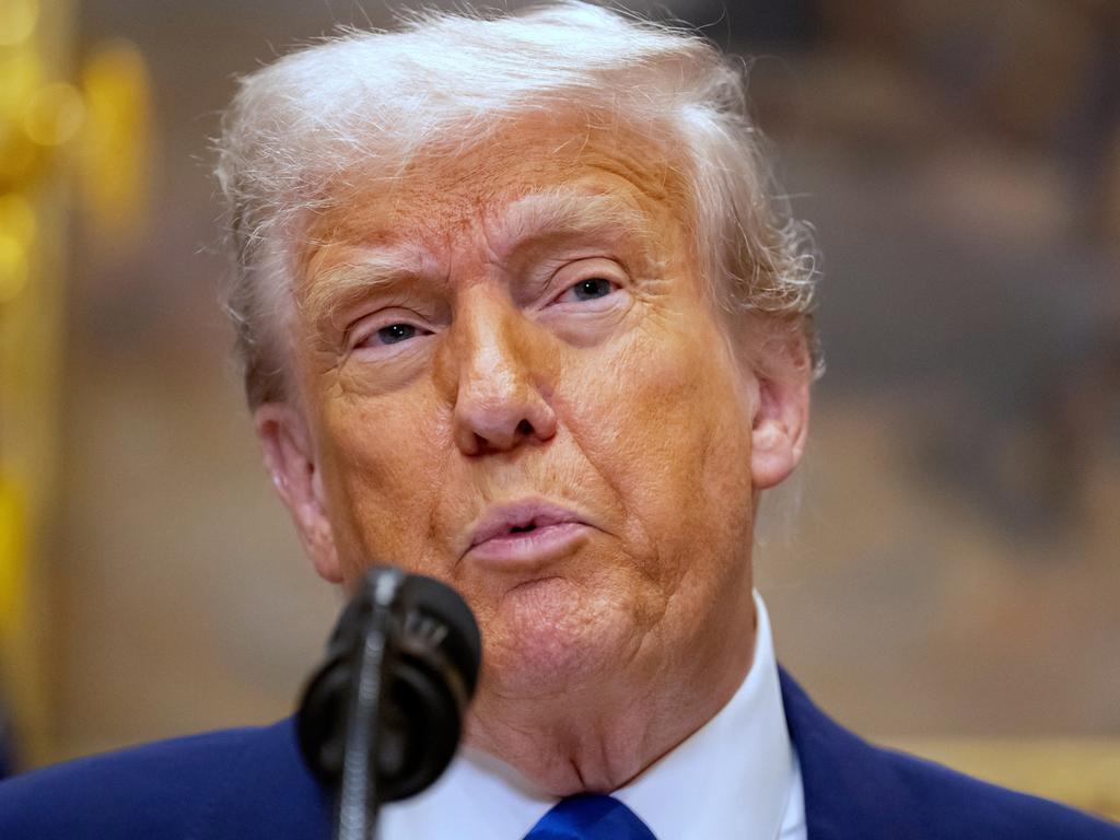 President Donald Trump has agreed to slash China tariffs. Picture: AP/Mark Schiefelbein