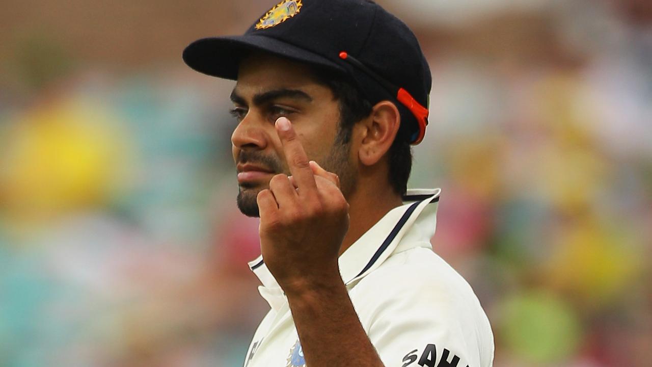 Virat Kohli shows the crowd his appreciation in 2012.