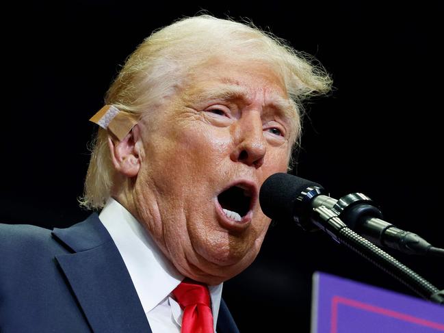 GRAND RAPIDS, MICHIGAN - JULY 20: Republican presidential nominee, former U.S. President Donald Trump speaks during a campaign rally at the Van Andel Arena on July 20, 2024 in Grand Rapids, Michigan. Trump's campaign event is the first joint event with his recent vice presidential pick Sen. JD Vance (R-OH) and the first campaign rally since the attempted assassination attempt his rally in Butler, Pennsylvania.   Anna Moneymaker/Getty Images/AFP (Photo by Anna Moneymaker / GETTY IMAGES NORTH AMERICA / Getty Images via AFP)