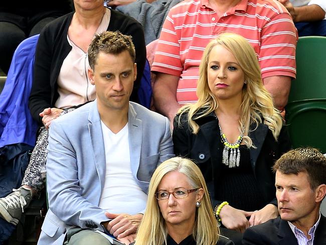 A pregnant Carrie Bickmore with partner Chris Walker at the Australian Open.