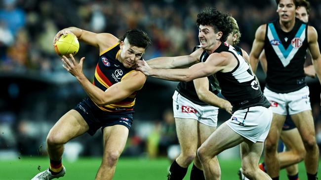 ADELAIDE, AUSTRALIA – MAY 02: Jake Soligo of the Crows competes with Darcy Byrne-Jones of the Power during the round eight AFL match between Adelaide Crows and Port Adelaide Power at Adelaide Oval, on May 02, 2024, in Adelaide, Australia. (Photo by Mark Brake/Getty Images)