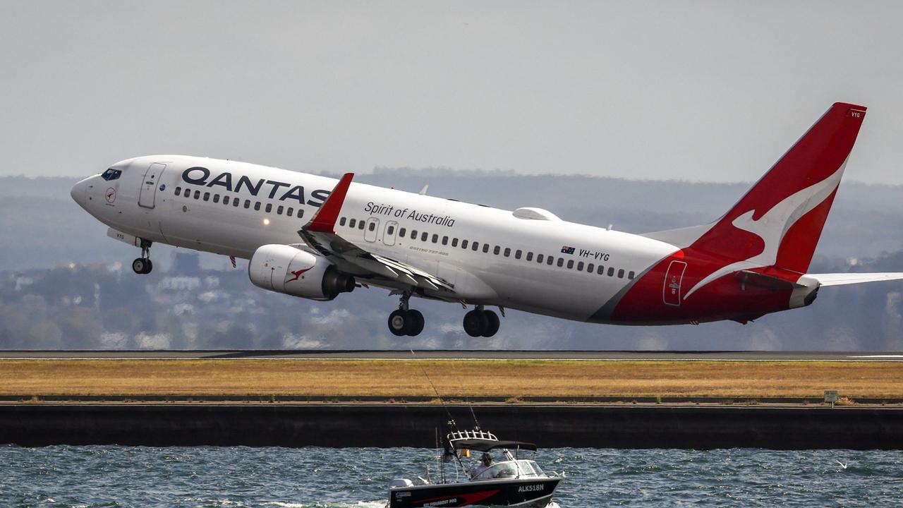 Qantas is copping some flack over Rex’s owes. (Photo by DAVID GRAY / AFP)