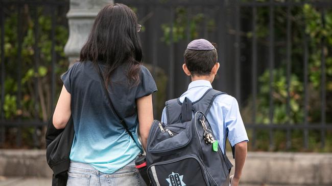 Students arrive at Mount Sinai College in Maroubra, Sydney, for some their first day at school, to find anti-Semitic graffiti sprayed on walls. Picture: Julian Andrews