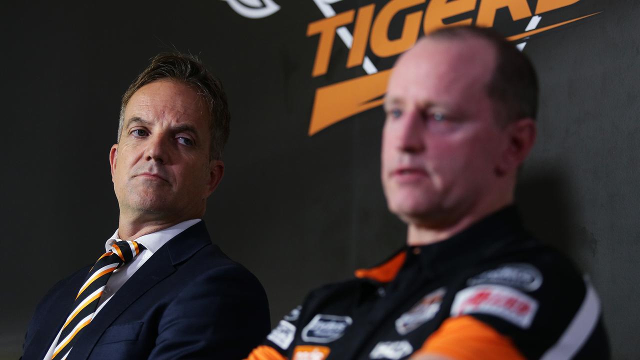 Wests Tigers CEO Justin Pascoe (left), is advocating for booster shots for the playing group at his club. Picture: Brett Costello