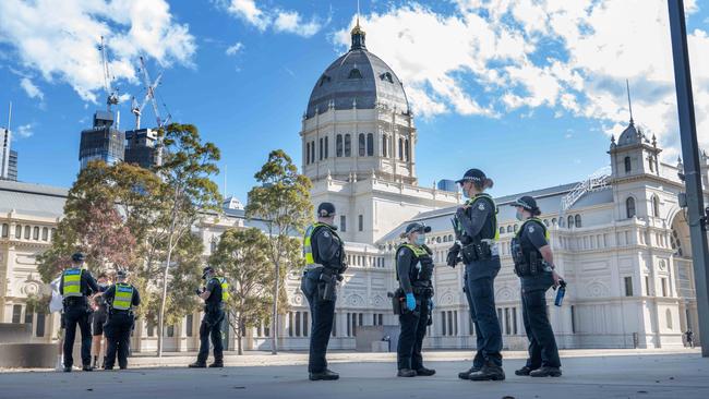 Police presence at the Royal Exhibition Building vaccination hub. Picture: Tony Gough