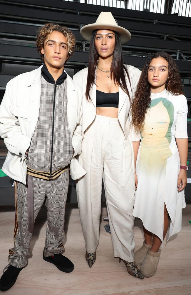 Alves (centre) with son Levi and daughter Vida at Paris Fashion Week last March. Picture: Pascal Le Segretain/Getty Images