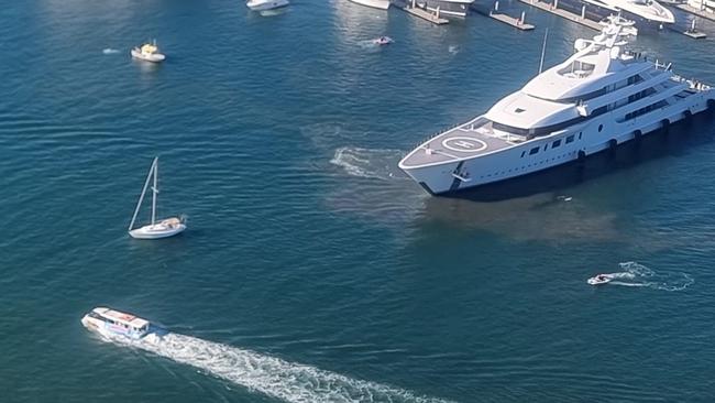 Evan Spiegel's $200m yacht, Bliss cruising next to the Aquaduck. Photo: Matt Watrach/Facebook,