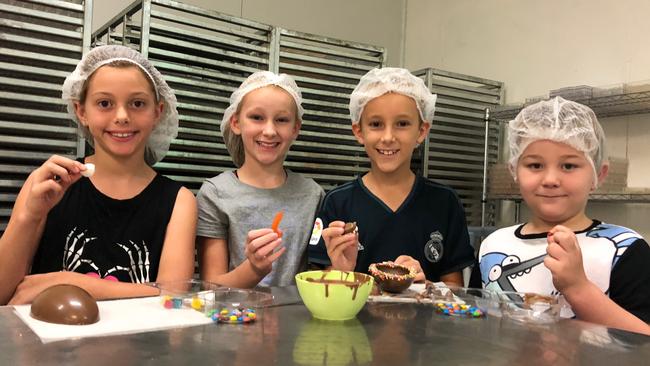 Poppy Ritchie, 8, Lilly Marshall, 11, Sam Marshall, 9, and Eliot Edwards, 6, took part in the chocolate making experience yesterday. 