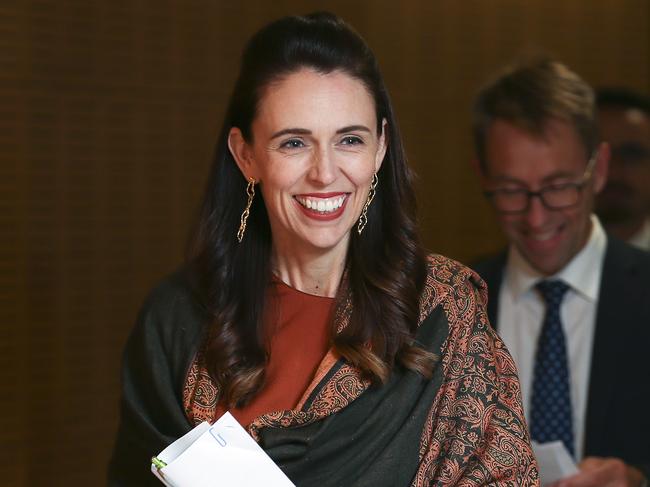 WELLINGTON, NEW ZEALAND – FEBRUARY 17: Prime Minister Jacinda Ardern arrives at a press conference at Parliament on February 17, 2021 in Wellington, New Zealand. Jacinda Ardern announced that the current lockdown measures would reduce at midnight, with Auckland moving to level 2 and the rest of New Zealand to level 1. Auckland moved to alert level 3 COVID-19 lockdown for three days following the discovery of three new locally acquired coronavirus cases on Sunday. The rest of New Zealand moved to level 2 restrictions. Health authorities are continuing work to identify the source of infections. (Photo by Hagen Hopkins/Getty Images)