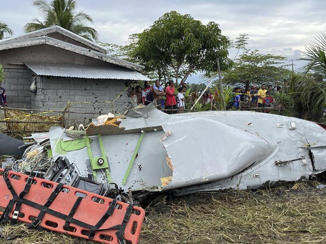 Wreckage of airplane in a rice field in Maguindanao del Sur province, Philippines, after officials say a U.S. military-contracted plane has crashed in a rice field in the southern Philippines, killing all four people on board, on Thursday Feb. 6, 2025. (Sam Mala/UGC via AP)