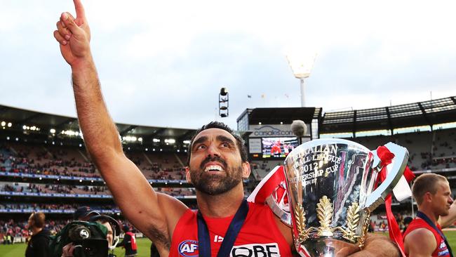 Adam Goodes celebrates with the cup after the Swans won the 2012 AFL grand final.