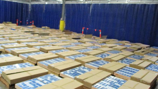 Two people were sentenced after ABF officers intercepted a consignment of pallets labelled "bathroom cabinets" which had over a million sticks of illicit cigarettes. Picture: ABF