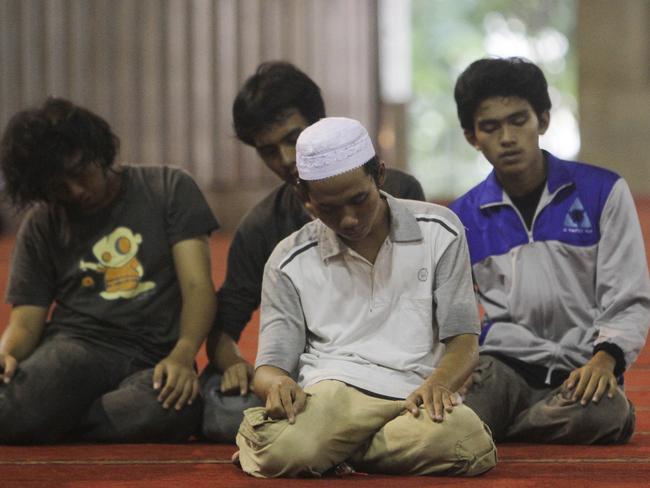 Indonesian Muslim men pray at Istiqlal Mosque in Jakarta. Picture: Irwin Fedriansyah/AP