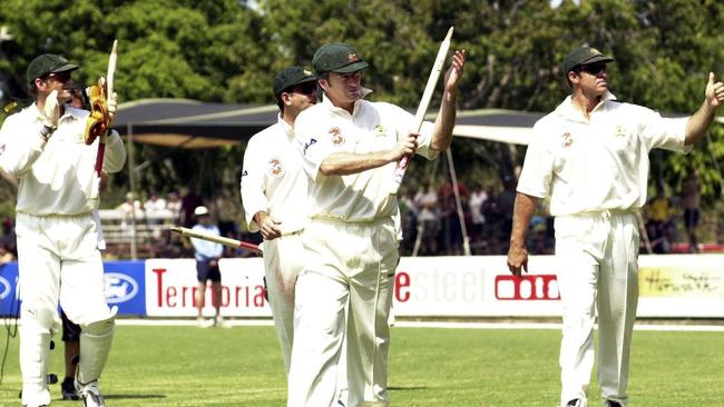 Waugh (centre) and teammates Adam Gilchrist (left) and Matthew Hayden thank the Darwin crowd after winning the Test inside three days. Picture: Dean Lewins