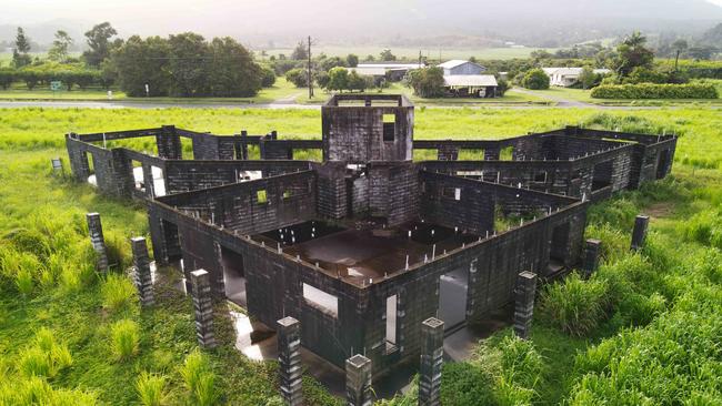 A large block mansion, located on the Bruce Highway at the northern end of the township of Mirriwinni, has remained unchanged in its partially built state. Picture: Brendan Radke