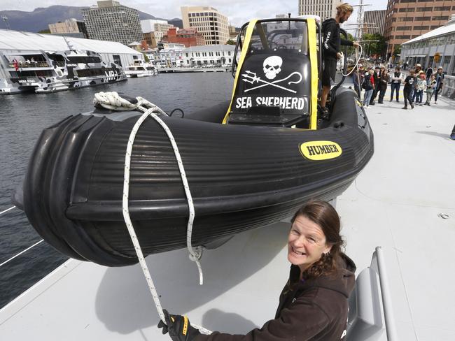 free public tours of Sea Shepherd's new Antarctic patrol vessel, Ocean Warrior, in Hobart, picture of crew Penny Keeling from USA tying of their new state of the art Zodiac, picture;KIM EISZELE