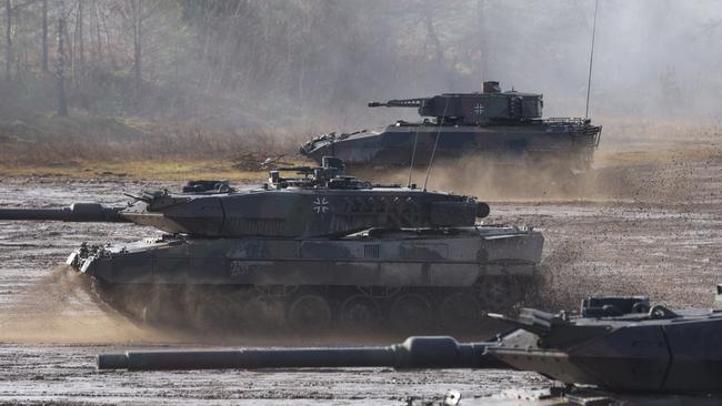 Heavy battle tanks of the Bundeswehr's 9th Panzer Training Brigade as German Defence Minister Christine Lambrecht increases troops in Eastern Europe. Picture: Getty Images.