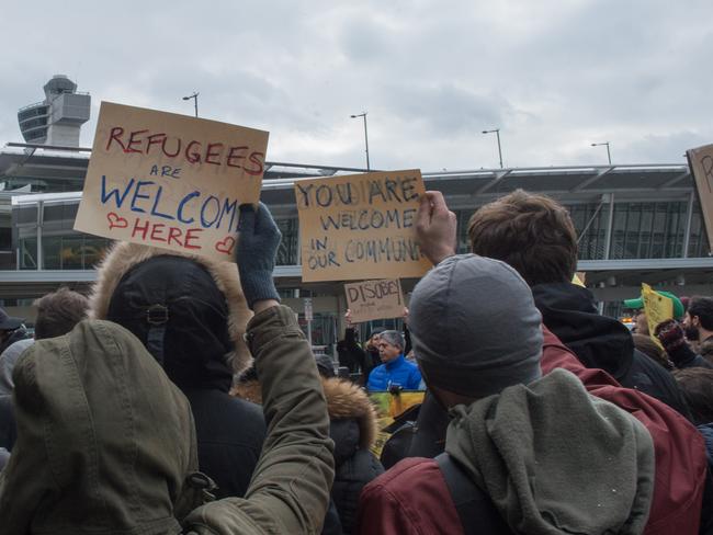 Protesters gather at JFK International Airport's Terminal 4 to demonstrate against US President Donald Trump's executive order. Picture: AFP