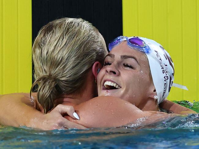 BRISBANE, AUSTRALIA - JUNE 12: Ariarne Titmus of Queensland is congratulated by Shayna Jack of Queensland after winning the WomenÃ¢â¬â¢s 200m Freestyle Final in a new world record time of 1:52.23 during the 2024 Australian Swimming Trials at Brisbane Aquatic Centre on June 12, 2024 in Brisbane, Australia. (Photo by Quinn Rooney/Getty Images)